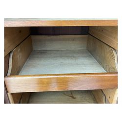 Late Victorian walnut triple combination wardrobe, projecting moulded and dentil cornice, central shaped bevelled mirror glazed door, cartouche and curled leaf carved panels over figured walnut veneered panels, fitted with drawer to base, on bracket feet