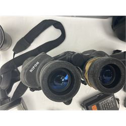 Yukon rubber armoured compact variable power spotting scope (boxed), together with Bresser 10x50 binoculars, Bushnell Excursion 10x42 binoculars, camera equipment etc  