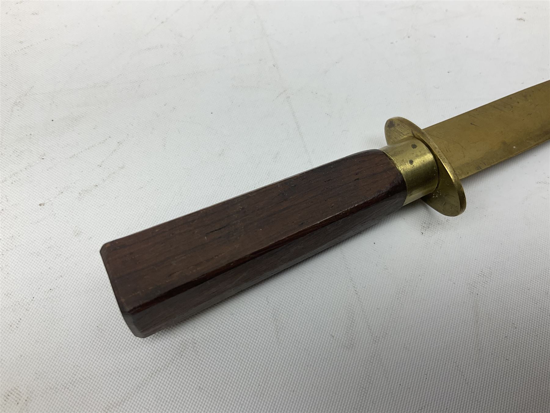 Malayan Kris dagger, the 31.5cm double edged straight heavy damascus blade with copper ferrule; carved hardwood grip; in large wooden throated scabbard with floral decorated white metal covering L47.5cm overall; a kris blade with adapted antler grip; and five various small daggers/letter openers (7)