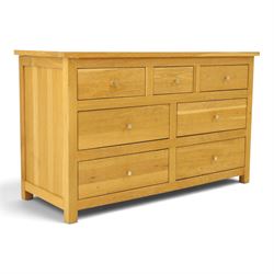 Contemporary light oak chest, rectangular top fitted with three short over four long drawers, on square feet