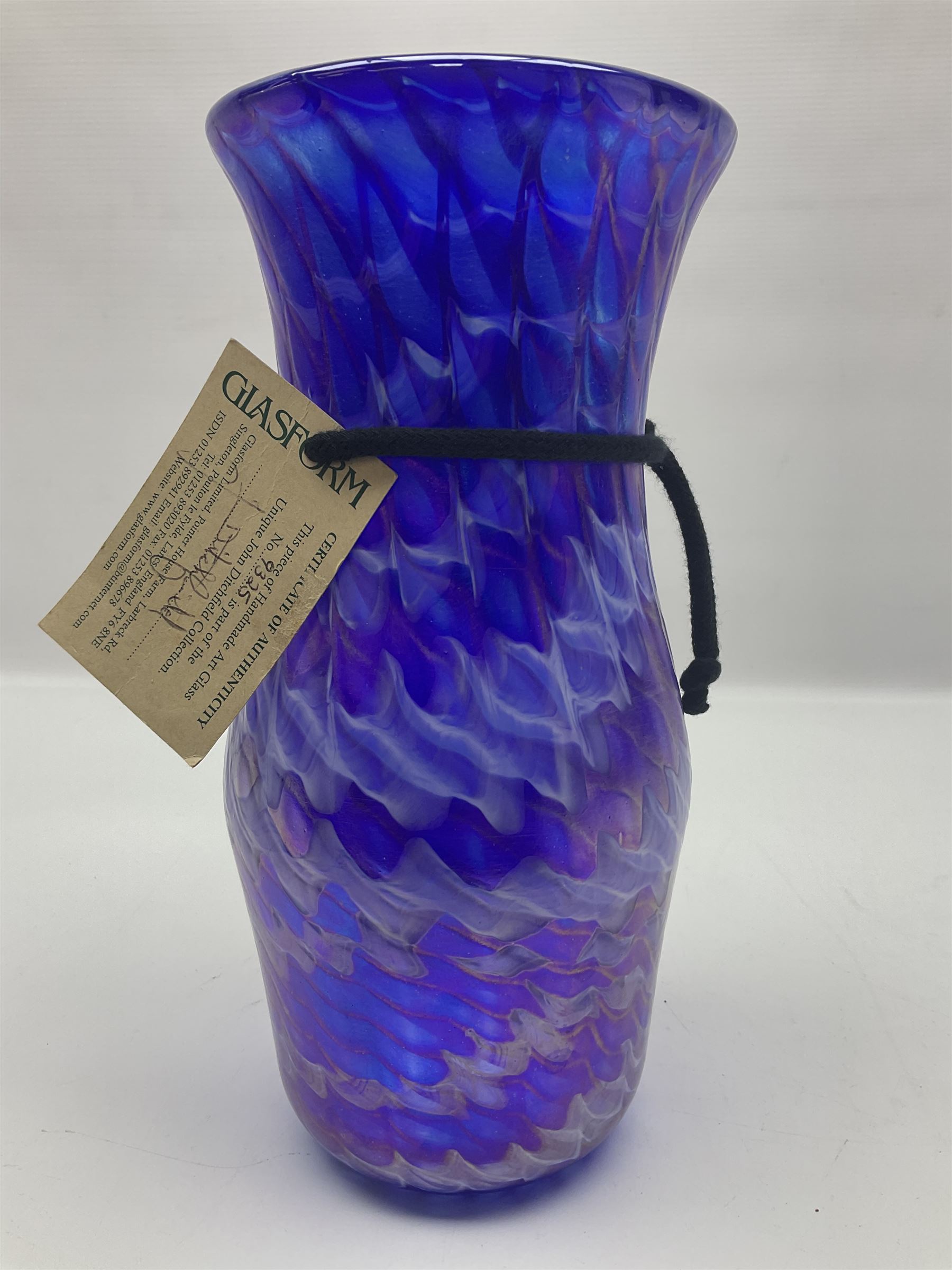 John Ditchfield for Glasform studio glass vase, with mottled wave design upon an iridescent purple ground, signed and numbered beneath, with certificate of authenticity tag, H26.5cm