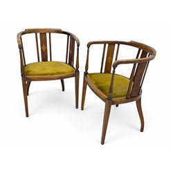 Pair of early 20th century Edwardian inlaid mahogany elbow chairs, shaped top rails with central diamond motif and line inlays, flanked by turned uprights, green velvet seats, on square tapered legs