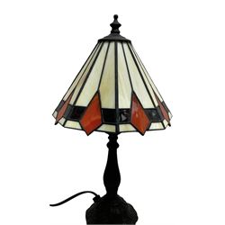 Tiffany style lamp with geometric pattern and matching small example, largest H47cm