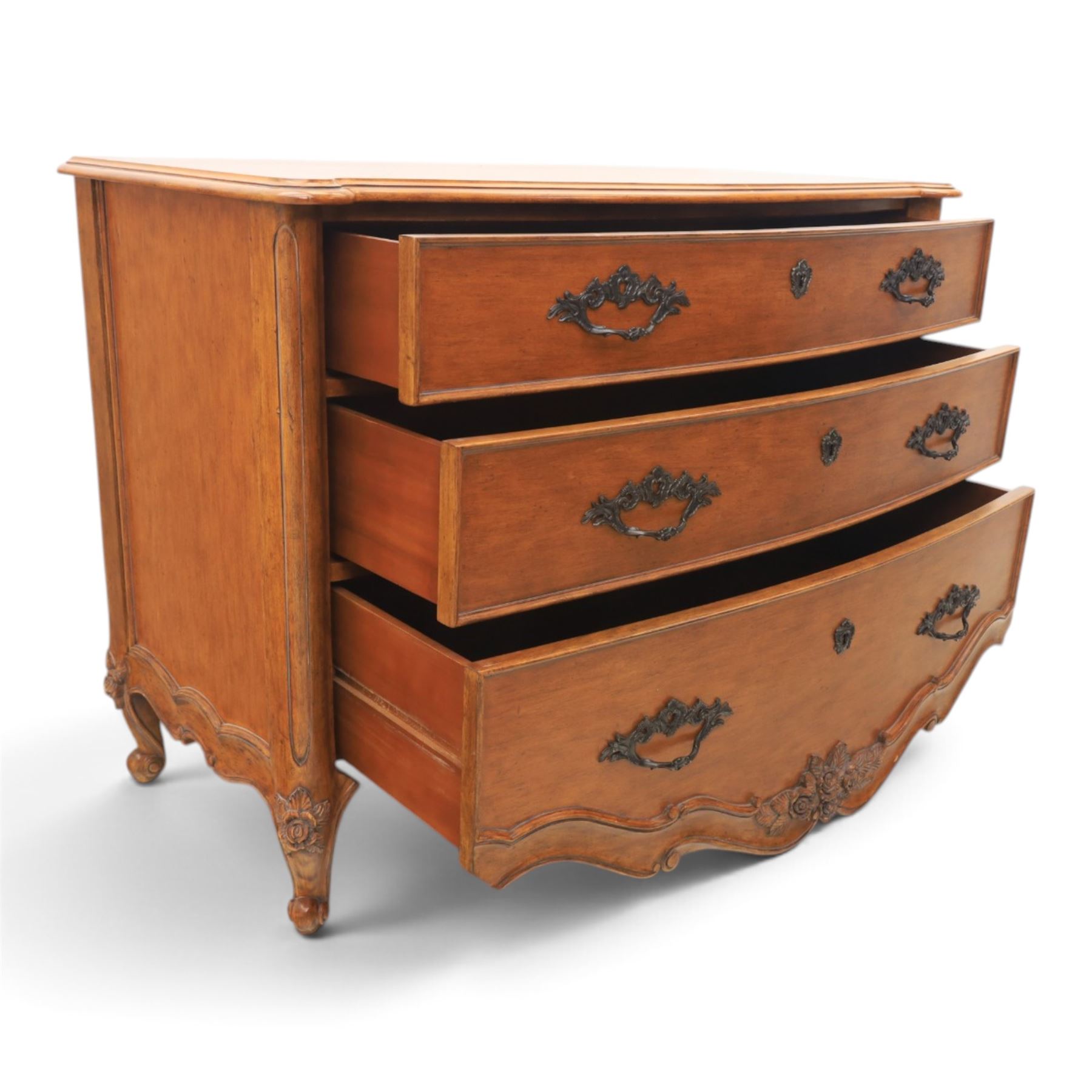 And So To Bed - 'Louis XV' large cherrywood chest, bowed shaped top above three long graduating drawers, blackened metal handles and escutcheons, raised on scrolled supports with carved foliate knees 