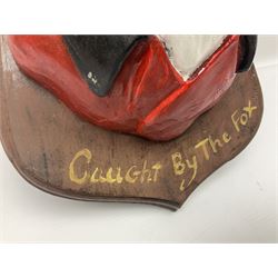 Composite figure of the head of a huntsman on a shield 'Caught by the Fox', D28cm