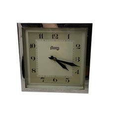 Spring wound mantle clock and twin bell alarm clock
