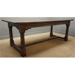  Rectangular oak refectory dining table, planked top, four turned supports joined by square stretchers, (W91cm, H77cm, L214cm) and set eight (6+2) oak chairs, shaped cresting rail, carved splat, turned uprights and supports, solid wood seats  