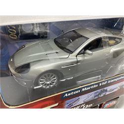 RCERTL Joyride James Bond 1:18th scale die-cast model cars - Lotus Esprit (silvered) from The Spy Who Loved Me, Aston Martin V12 Vanquish from Die Another Day and Chevrolet Corvette from A View To A Kill, all boxed (3)