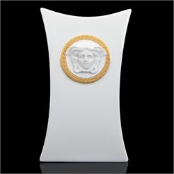 Rosenthal Versace Gorgona vase, of concave form, decorated in relief with medusa masks and gilt greek key borders upon a white ground, boxed, H17cm