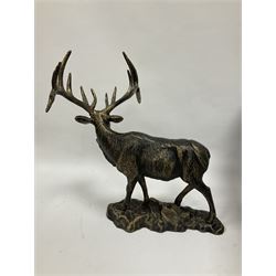 Bronzed cast metal figure of a stag upon a naturalistic base, H44cm