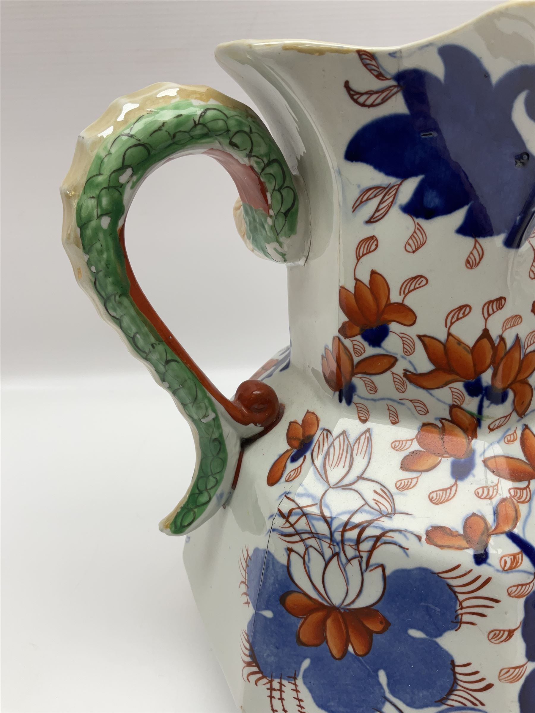 Two Masons Ironstone jugs, each in the Imari palette with serpent handles, with maker's mark beneath, tallest H24cm
