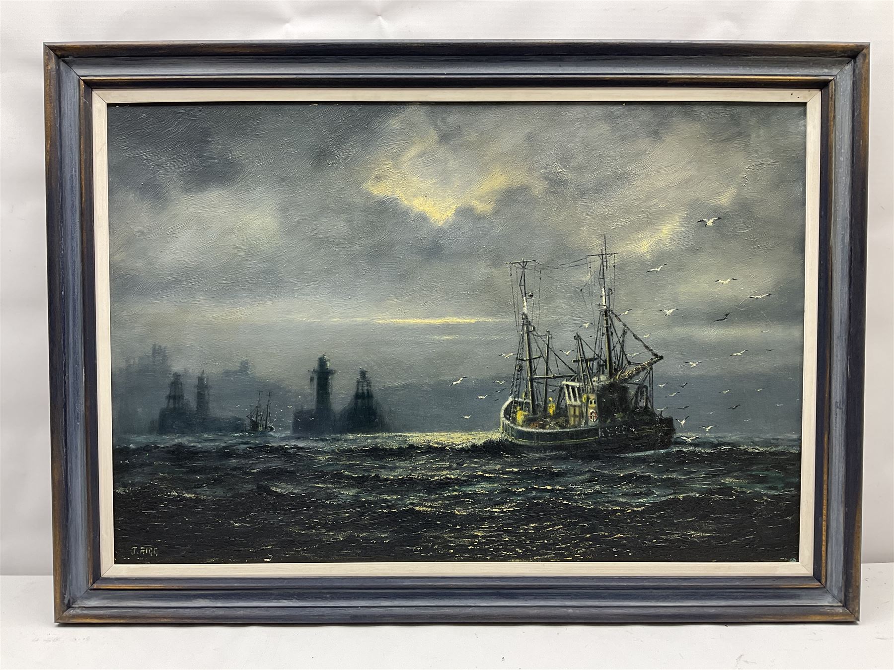 Jack Rigg (British 1927-): Fishing Boat Returning to Whitby Harbour by Moonlight, oil on canvas signed, dated 1972 verso 50cm x 75cm