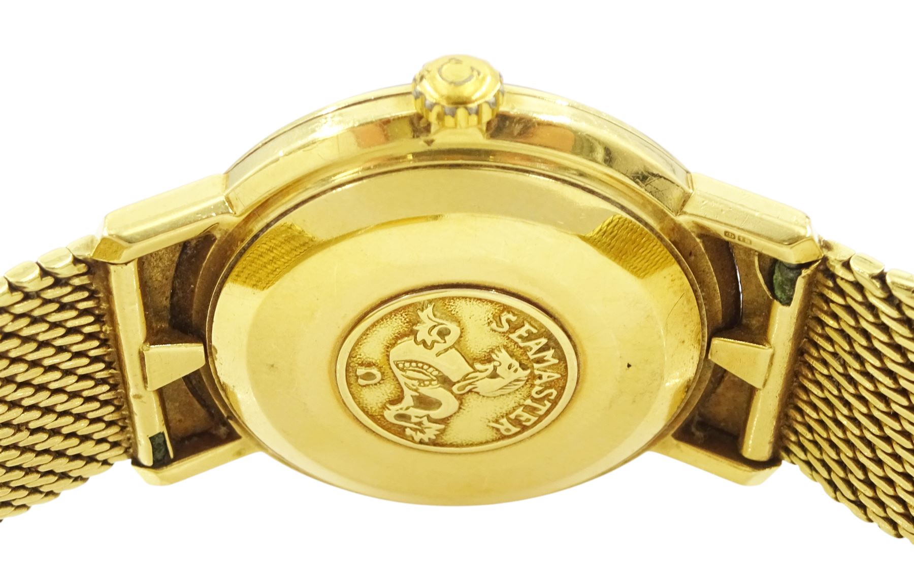 Omega Seamaster gentleman's 18ct gold automatic wristwatch, silvered dial with baton hour markers, on 18ct gold bracelet, with Omega clasp, London 1964