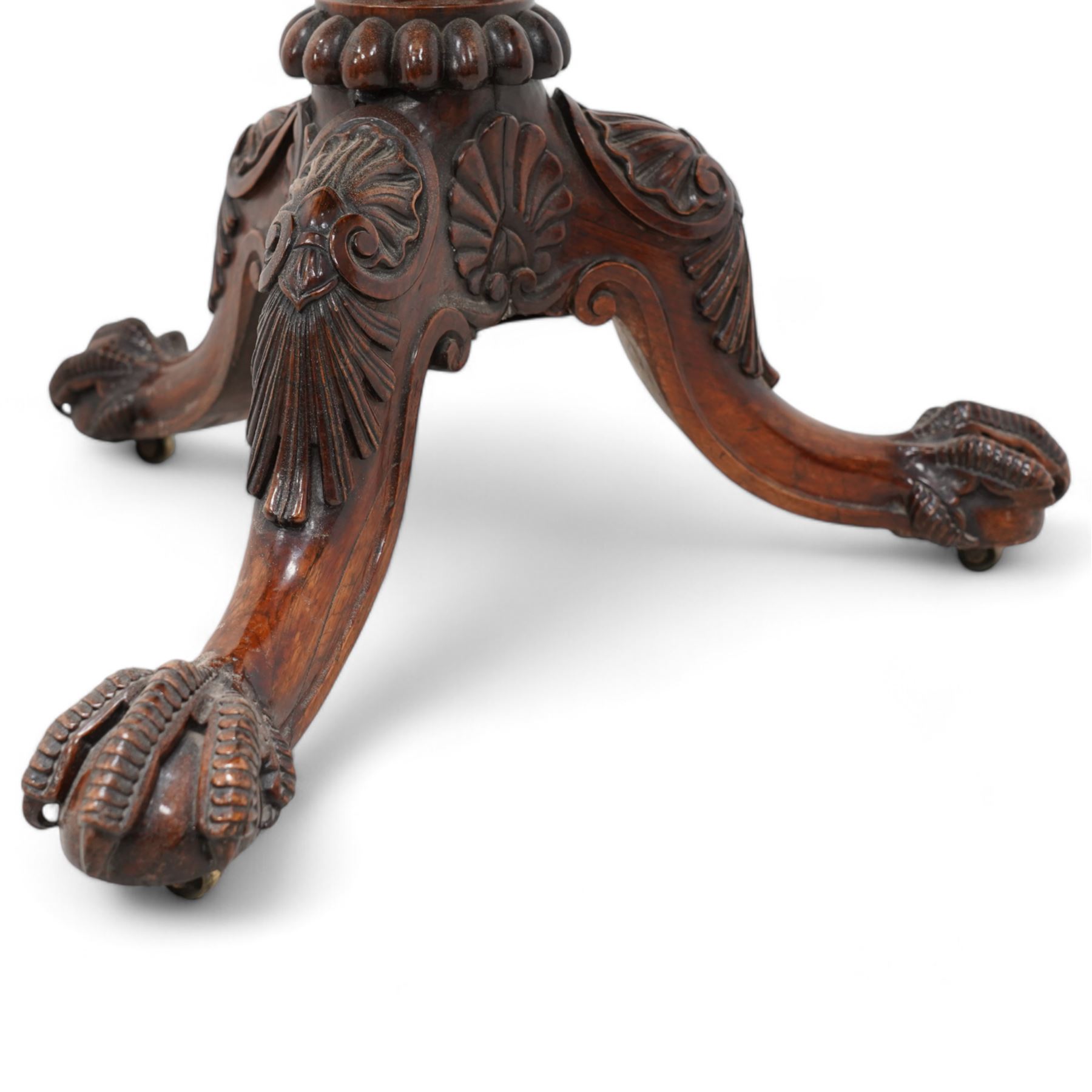 Possibly Gillows - 19th century rosewood tripod table, circular tilt-top with gadroon carved edge, turned column with lobed bands and curled acanthus leaf carved baluster, three out-splayed supports with shell carved knees and scaled ball and claw feet, 

Provenance:
Nidd Hall: acquired by Guy Reed from
Richard Butler, 17th Viscount
Mountgarret, in 1968
