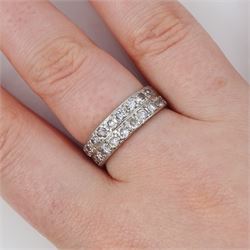 18ct white gold and platinum diamond half eternity ring, two rows each set with ten old cut diamonds, the sides with engraved decoration, Birmingham 1985, total diamond weight approx 1.20 carat