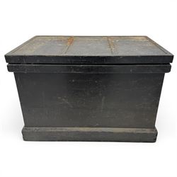 20th century black painted camphorwood lined tool chest, rectangular hinged lid over moulded edge, black painted exterior with iron straps and carry handles, the interior fitted with sliding lidded trays and drawers with turned handles, containing an assortment of hand tools