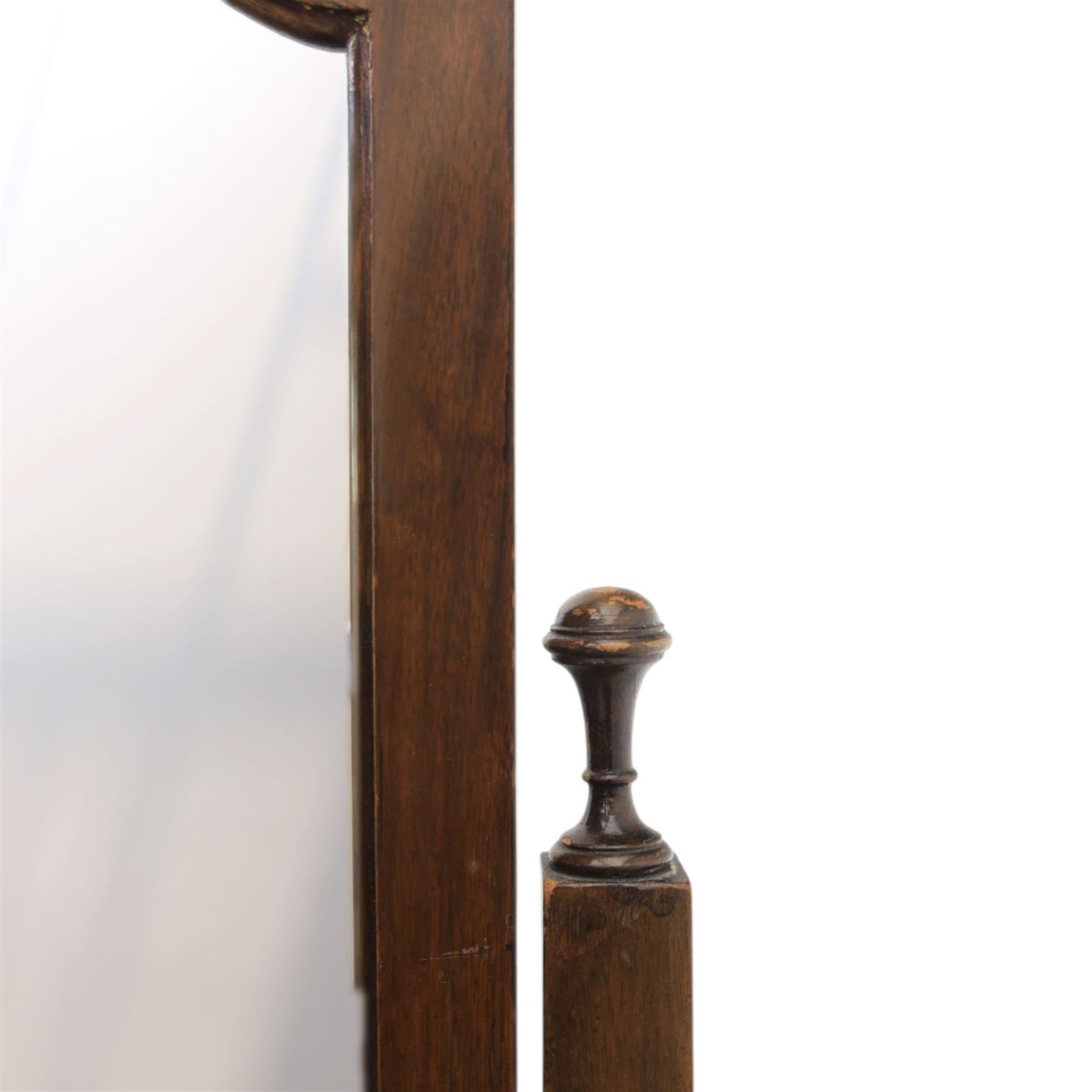 Georgian style mahogany cheval mirror, arched rectangular mirror plate within a moulded frame, on turned supports with brass adjustment mounts, raised on downswept supports terminating in claw feet