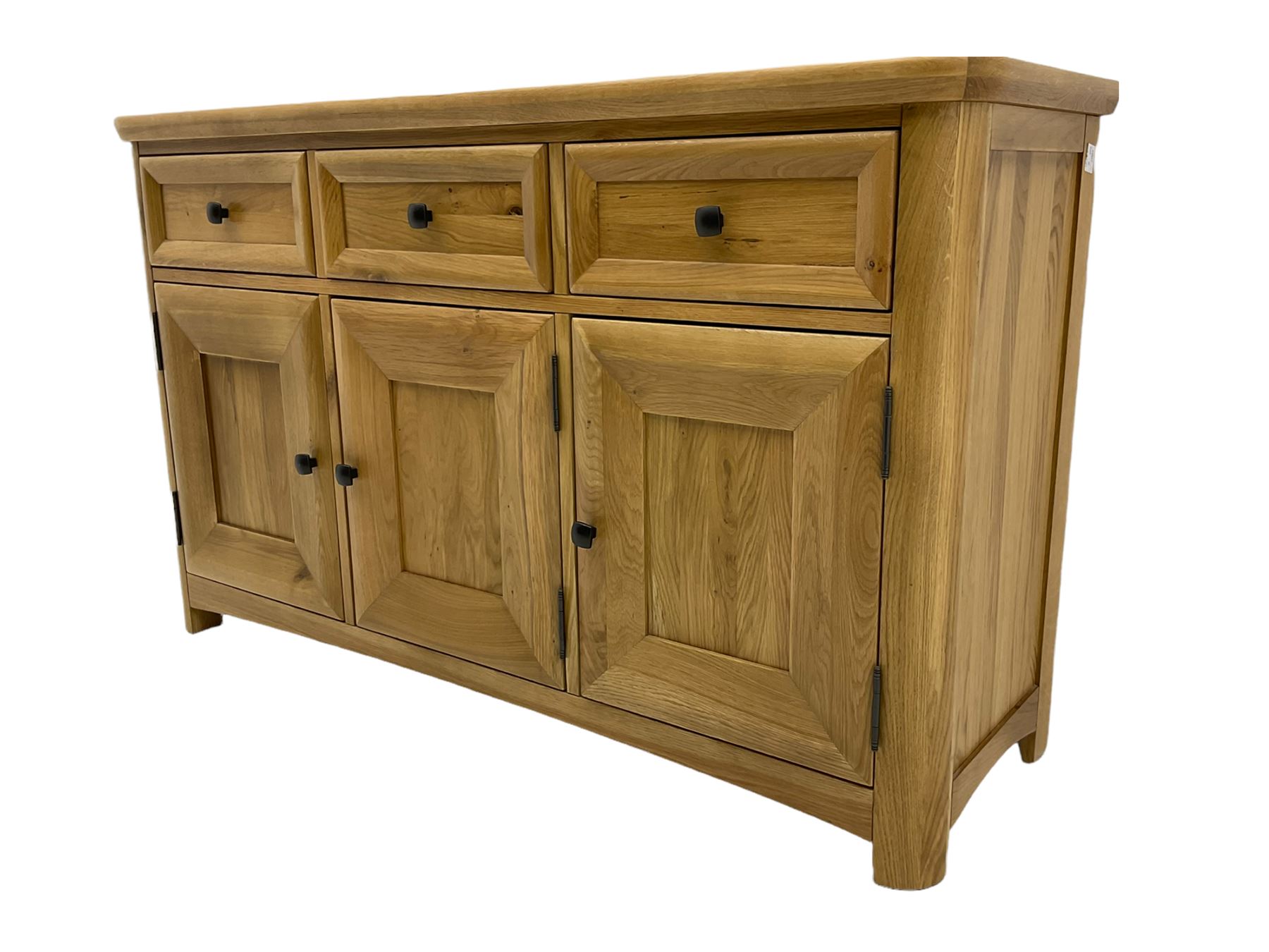 Solid light oak sideboard, fitted with three drawers and three