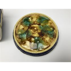 Majolica cheese dome and cover decorated with birds amongst foliage in relief on a blue ground 
