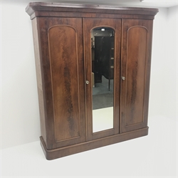  Victorian mahogany triple wardrobe, projecting cornice, three doors, single full length mirror, fitted interior including five linen and three standard drawers, plinth base, W190cm, H207cm, D57cm  