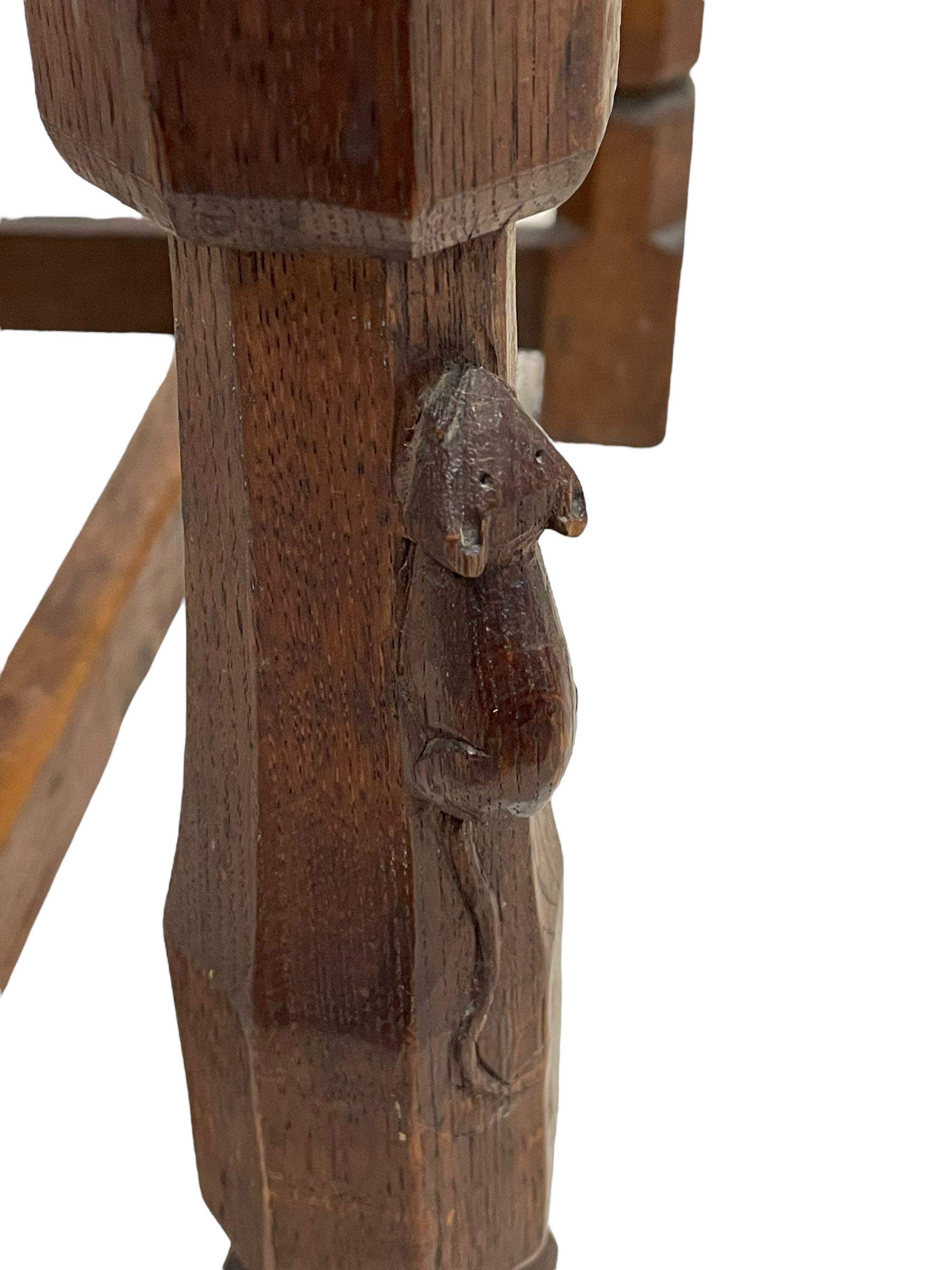 Mouseman - circa. 1930s set of six (4+2) oak dining chairs, panelled back carved with the Bagshawe family crest, the moto 'Forma Flos Fama Flatus' over an arm grasping a bugle-horn with ribbon tie and Yorkshire rose motif, adzed frame, leather lattice strap seat, on octagonal supports united by stretchers, two carvers and four side chairs, each carved with mouse signature, by Robert Thompson of Kilburn 

Provenance: Owned since manufacture by the Bagshawe family, descendants of the Staithes Group Artist Joseph Richard Bagshawe RBA (1870-1909).