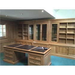  Bespoke craftsman made superior quality polished light oak panelled study library office comprising bookcases, lit by inset halogen lights, glazed display cabinets, cupboards, drawers, mirror, all set in Georgian fielded panels with fluted columns and traditional plinths, (desk included in next lot) approx 40k new. (viewing by appointment only Near Boroughbridge, contact William Duggleby).  