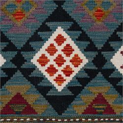 Afghan kilim teal ground runner rug, the field decorated with assorted lozenges with geometric motifs and dark indigo borders, enclosed by a narrow striped guard band
