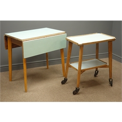  Formica two tier trolley, light teal finish, splayed tapering supports, (W62cm, H74cm, D40cm) and a similar drop leaf table, splayed tapering supports, (W76cm, H76cm, D92cm)  