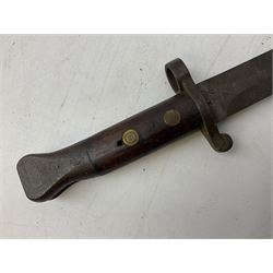 British Pattern 1907 bayonet with 43.5cm fullered steel blade; in leather scabbard with webbing frog L58cm overall; another Pattern 1907 bayonet lacking scabbard; and British Pattern 1888 Mk.I bayonet by Wilkinson London (no scabbard) (3)
