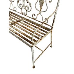 Regency design wrought metal garden bench, central lyre back with foliate S-scrolls with serpent masks, flanked by two floral mouldings and further scrolling, metal slatted seat on straight supports joined by H-stretcher 