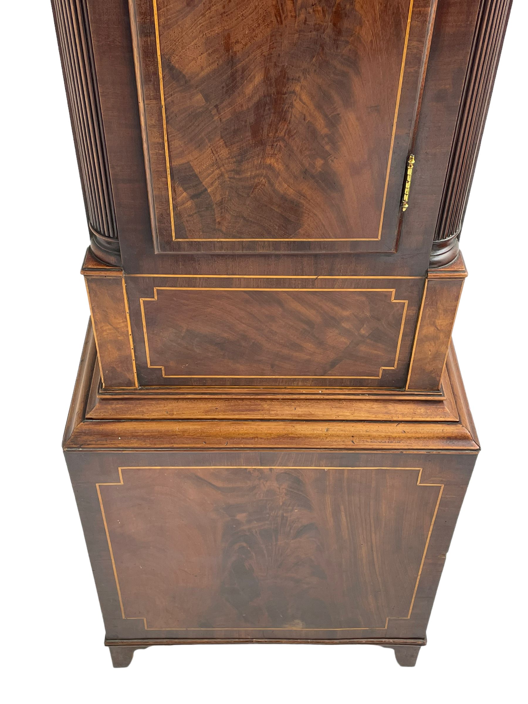 Samuel Ritchie of Forfar - William IV 8-day Scottish longcase clock in a mahogany case, with a swans neck pediment, brass paterae and three ball and spire brass finials, case and trunk inlaid with satinwood stringing on a plinth raised on decorative bracket feet, painted break arch dial depicting a costal scene to the break arch and conch seashells to the spandrels, Roman numerals, subsidiary seconds and date dials with matching steel hands, with a rack striking movement striking the hours on a bell. With weights, key, and pendulum.  Samuel Ritchie is recorded as working in Forfar 1800-37.