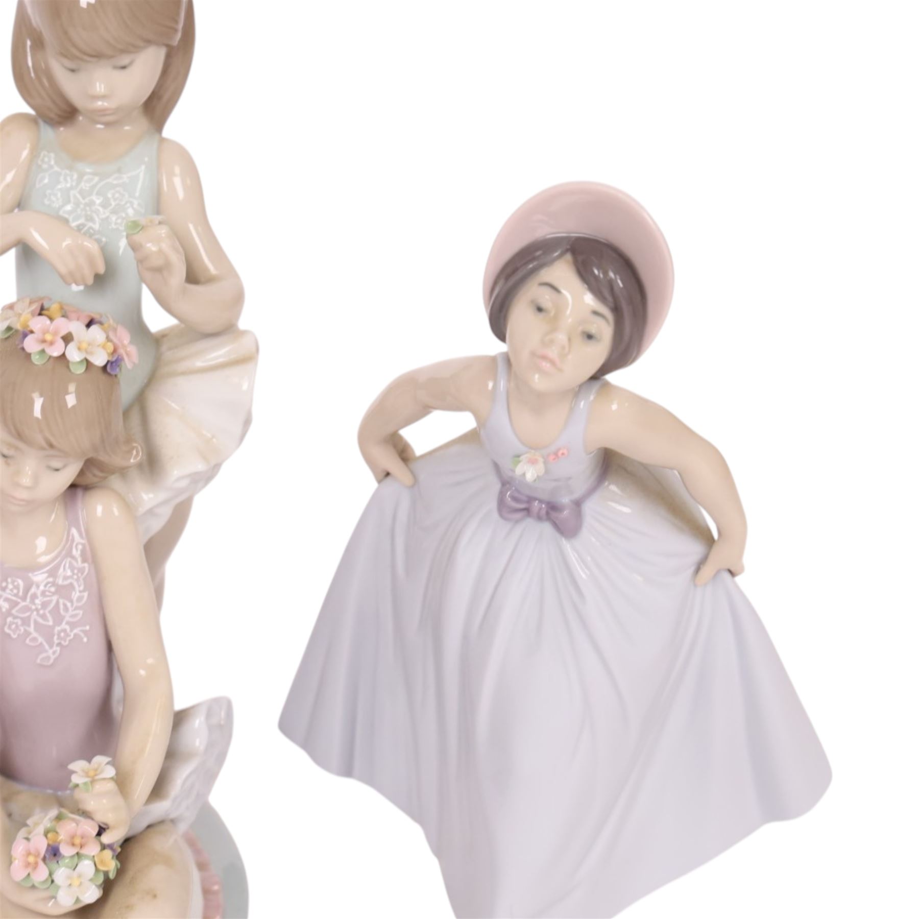 Four Lladro figurers, comprising First Ballet 5714, Iris 6276, Rose 6275 and Daisy 6274, all boxed 