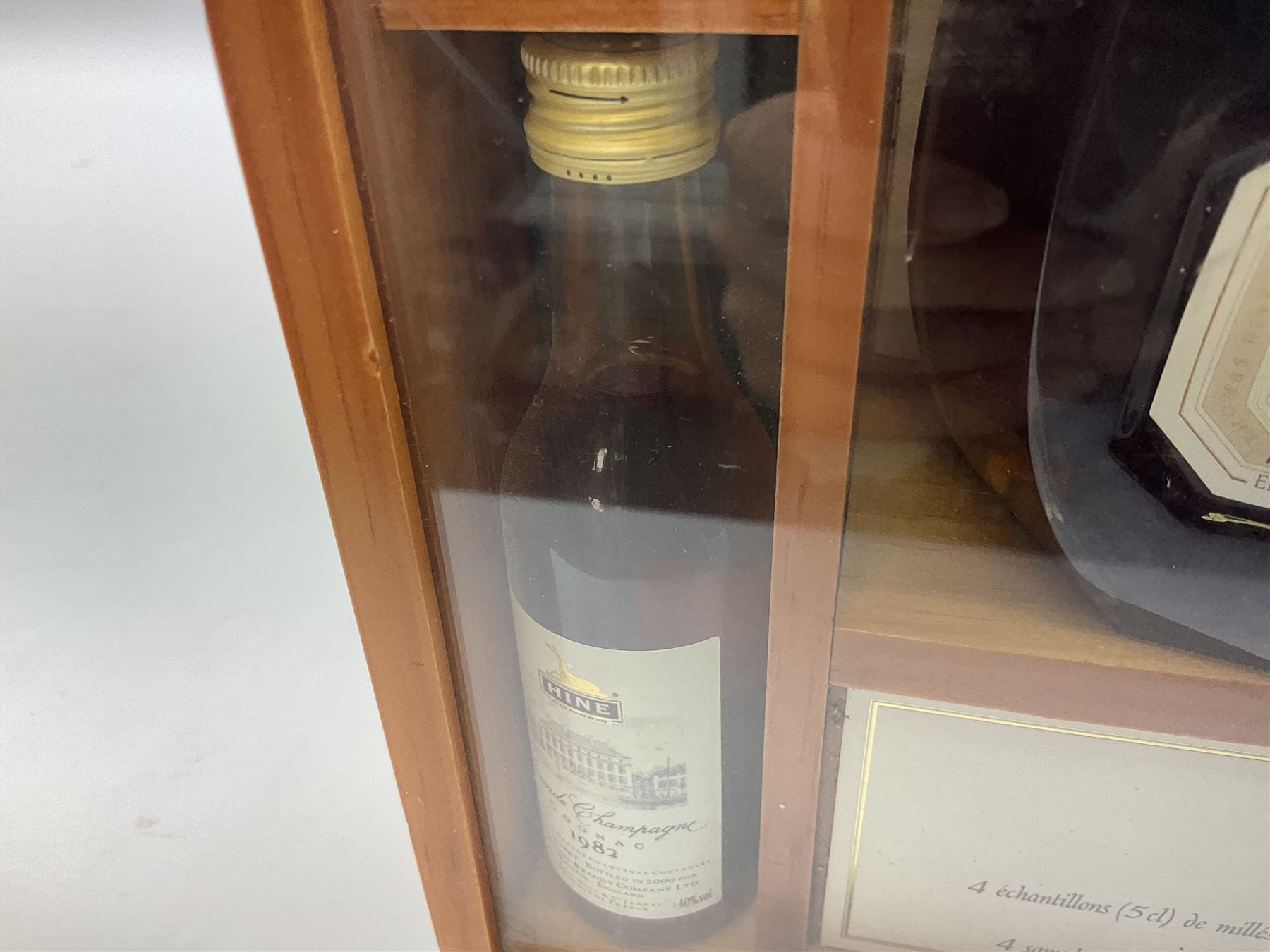 Presentation set comprising Hine Antique cognac 70cl, 40% volume and four miniature bottles of Hine cognac, 1957, 1960, two 1982, all 5cl, 40%   together with bottle of Tokaji sweet wine, 500ml, 13%