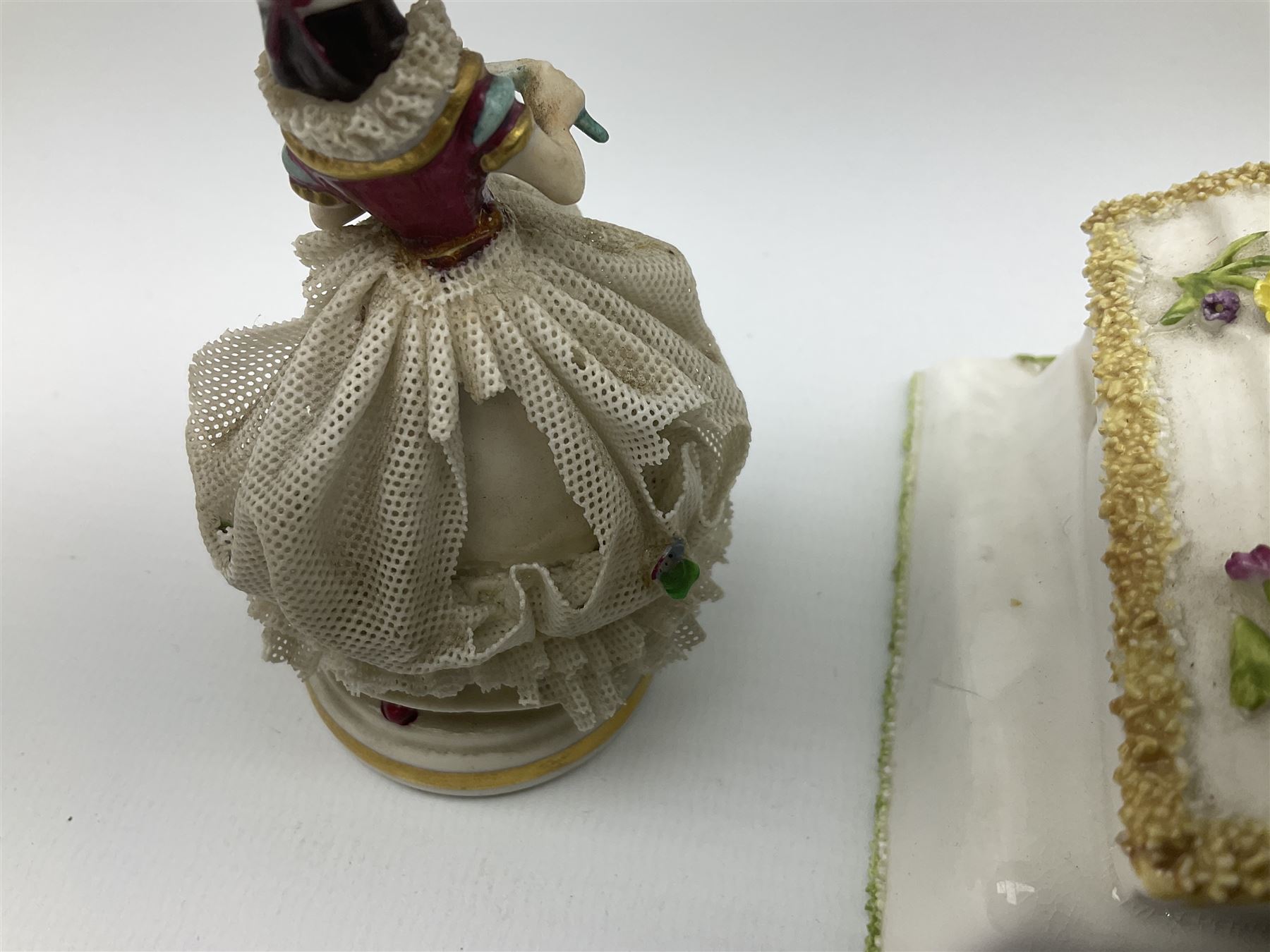 Group of figures, comprising six Royal Doulton examples, Daydreams HN1731, Silks and Ribbons HN2017, Tom Sawyer HN2926, Marie HN1370, Bo-Peep HN1811, and Tinkle Bell HN1677, together with a Dresden type 'lace' example, and a Coalport 'Swiss Cottage', (8)