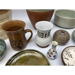 Quantity of studio pottery to include square section vase decorated with blossoming branches, other studio pottery to include jugs, bowls, vases etc, with various marks, duck egg b,J.E. bowl stamped Buchan, continental pottery, other stoneware pottery to include glazed jar with lid etc