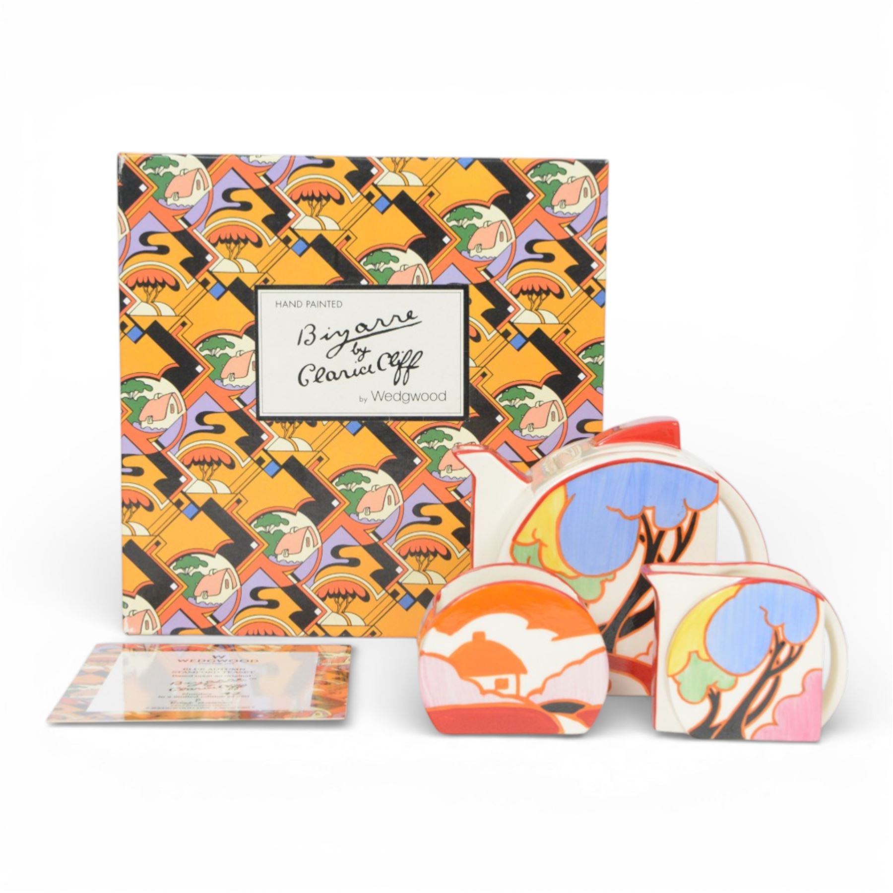 Wedgwood Bizarre by Clarice Cliff, Blue Autumn three piece Stamford teaset hand painted based upon an original, limited edition 42/250, with certificate and box