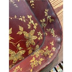 Early 19th century red lacquered papier-mâché tray by Clay of King Street Covent Garden, of rounded rectangular form, painted in gilt with large foliate sprays and butterflies, impressed verso CLAY KING ST COVENT GARDEN, W66.5cm D48.5cm