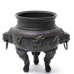 Early 19th century Chinese Qing Dynasty bronze censer, the body of globular form with circular neck and twin cast lion mask ring handles, decorated with applied figures of a monkey, deer and bird, against a key fret detailed ground, the whole upon three zoomorphic elephant feet, H16.4cm D12cm