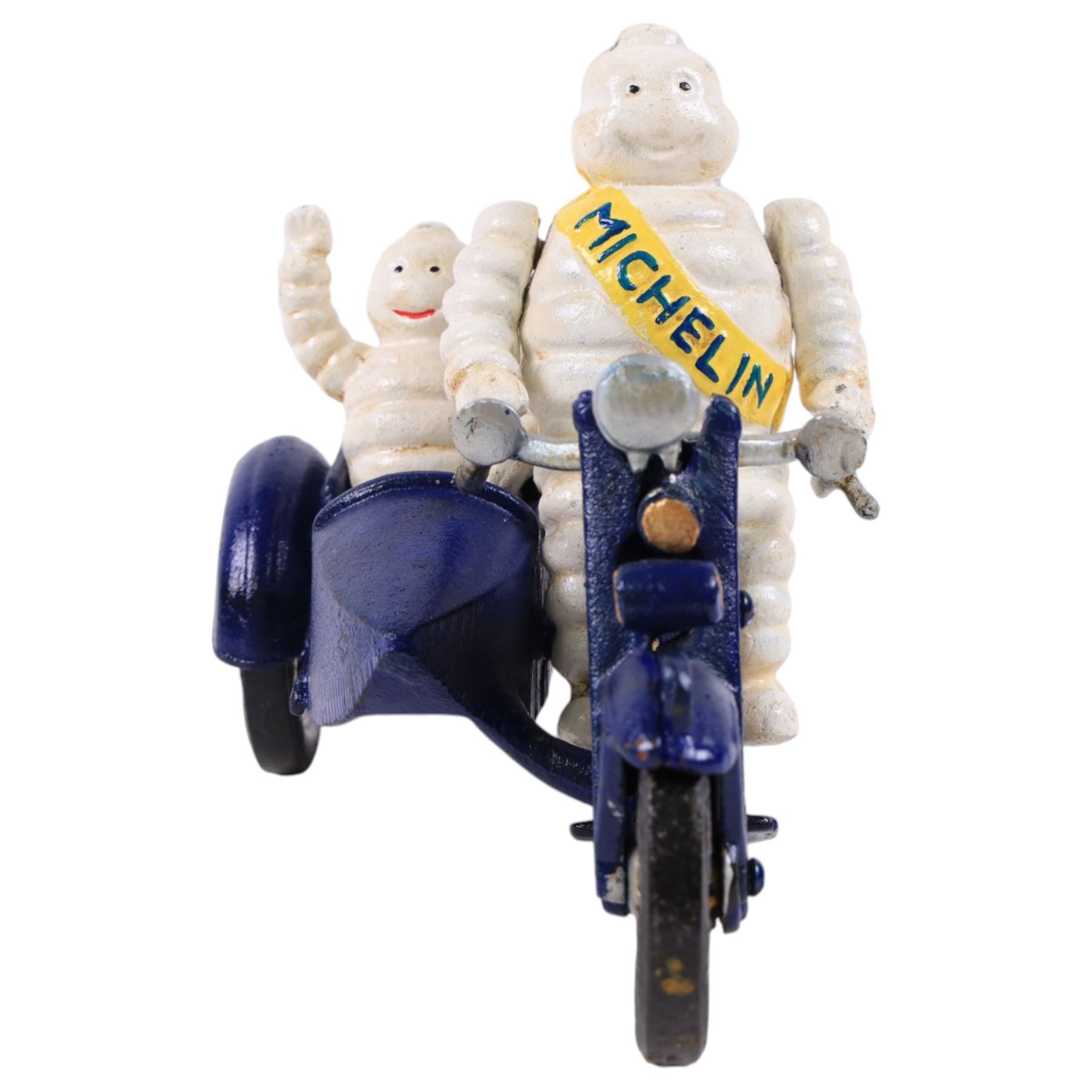 Cast iron figure, modelled as a Michelin man upon a motorbike, H18cm