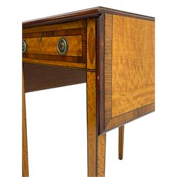 Mid-to-late 20th century Sheraton style satinwood Pembroke table, the drop leaf top with segmented veneers and central oval panel with ebony stringing, crossbanded in rosewood and with edge moulding, single short drawer to one end and faux drawer to other, square tapering supports