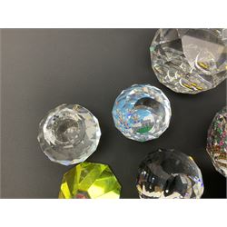 Swarovski Crystal paperweights, to include a globe with dove to the top, pyramid shapes etc, together with a large collection of boxes and stands  