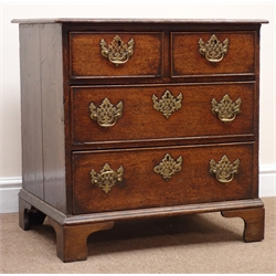  George III small oak chest, moulded top, two short and two cockbeaded drawers, shaped bracket supports, W67cm, H67cm, D46cm  
