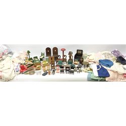 Quantity of predominantly wooden vintage dolls house furniture and accessories, various scales, including dining, lounge and bedroom furniture etc; together with a large quantity of vintage dolls clothing, both knitted and material made