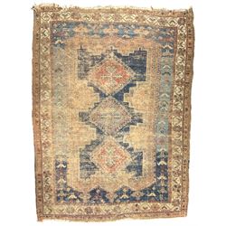 Antique Caucasian rug, indigo ground field decorated with three lozenge medallions within borders of stylised bird and flower head motifs