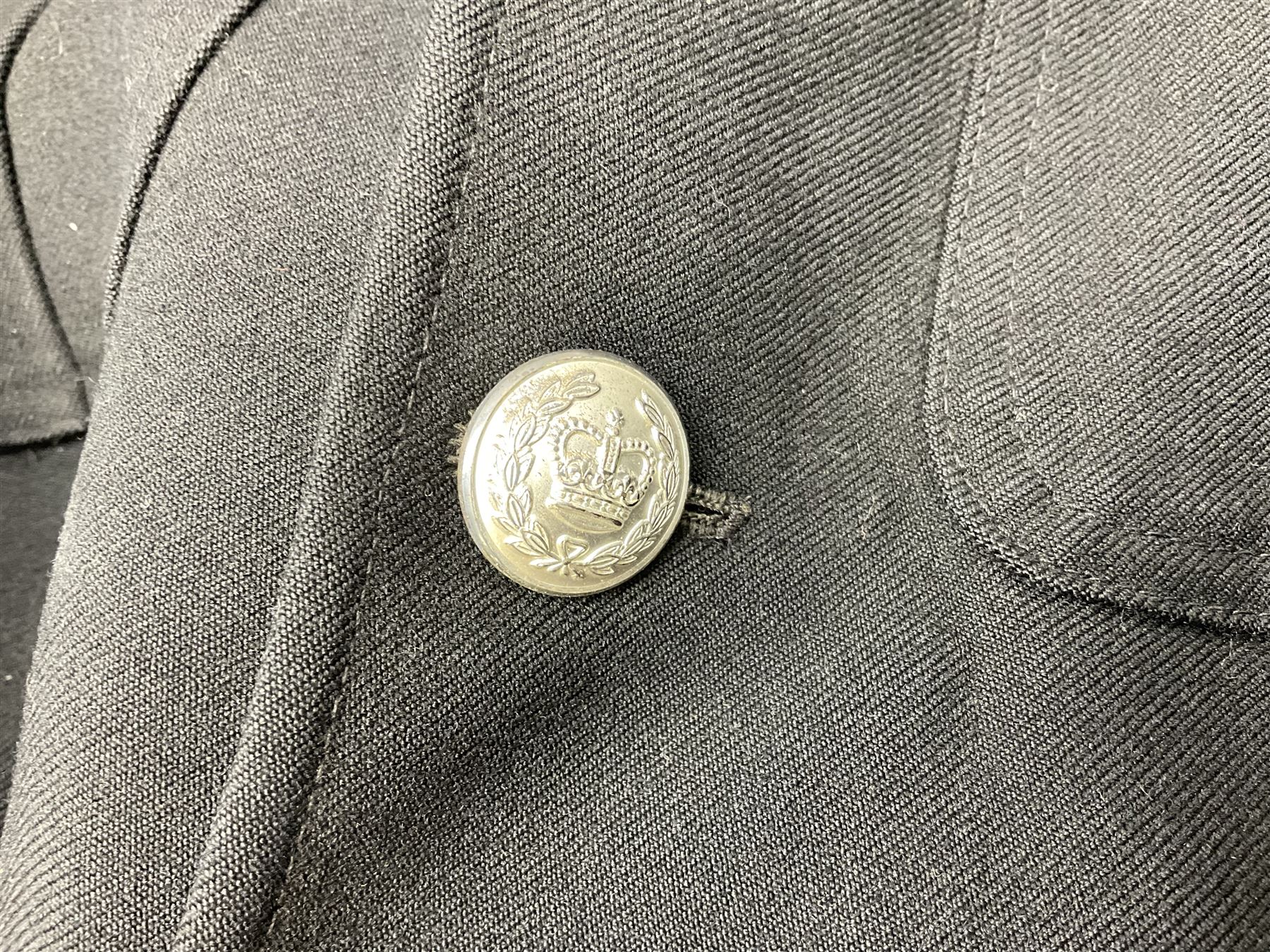 LNER Police cape; indistinctly dated 1943(?); York & North East Yorkshire Police belted tunic; belted tunic with Chief Constable epaulettes and buttons; and another tunic with staybrite Queens Crown buttons (4)