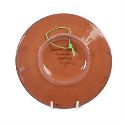 Large mid-20th century Spanish Puigdemont studio pottery charger, depicting a stylised fish, together with three other plates decorated with fish 