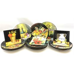 A set of ten Spanish pottery wall chargers, each decorated with still life scene, marked verso Pintado a Mano, D39cm, together with three smaller square examples. 