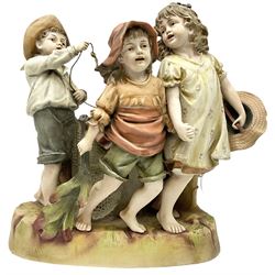 Large Victorian bisque figure group, modelled as three children at a beach with fishing net and seaweed, inspired by the Victorian painting 'The Sea Horses', H33cm L36cm 
