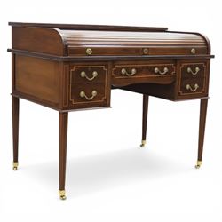 George III style inlaid mahogany tambour desk, the roll top enclosing fitted interior with...