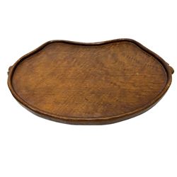 Mouseman - adzed oak kidney shaped tea tray with twin carved mouse signature handles, by the workshop of Robert Thompson, Kilburn, L45cm